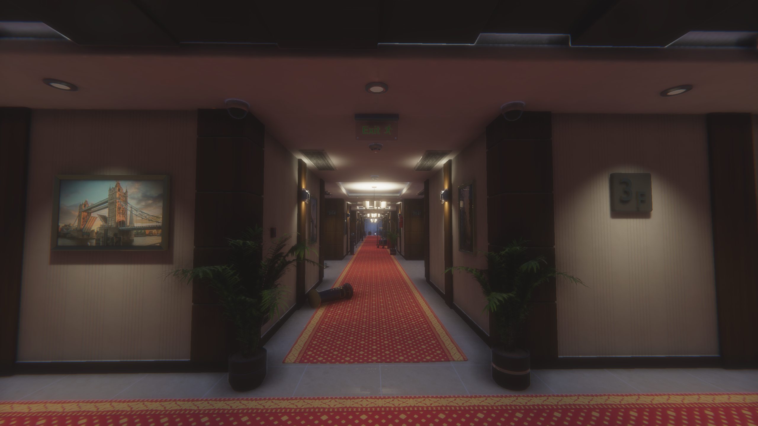 A long red-carpeted hotel corridor